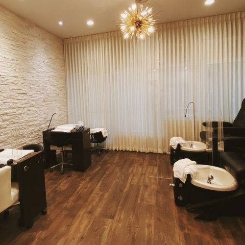 Nail area with pedicure chairs and manicure stations